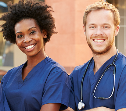 An African-American female therapist and a Caucasian male doctor with stethoscope